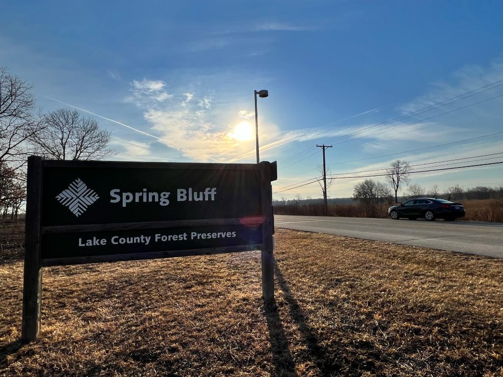 Spring Bluff Lake County Forest Preserves entrance sign at sunset